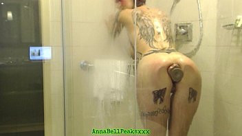 Play Hot Tattoo MILF Gets Filmed In Shower